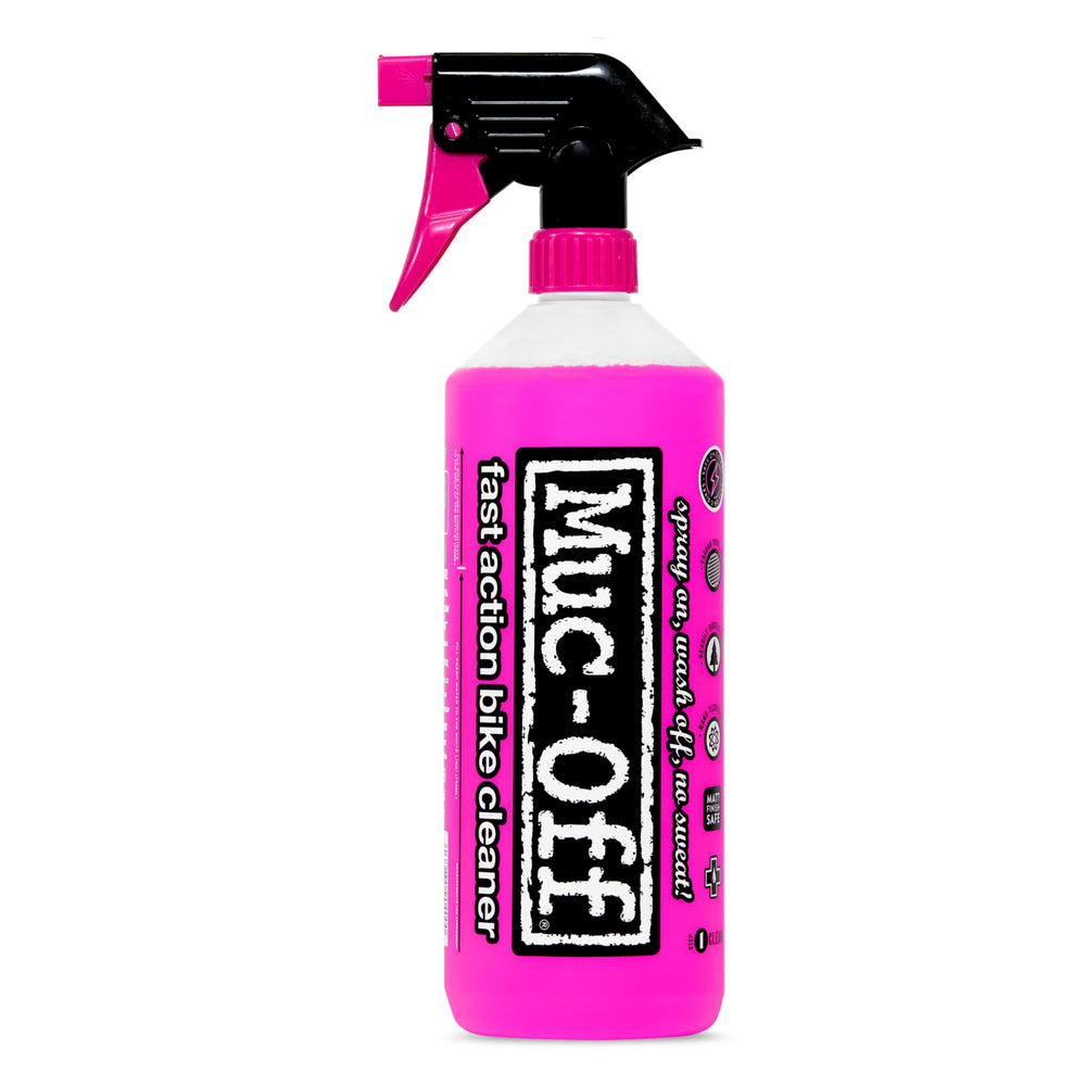 Muc-Off brushes and expanding sponge laid out for efficient deep-cleaning of bike