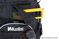MUELLER close-up of utility sleeve holding shears for quick tool access