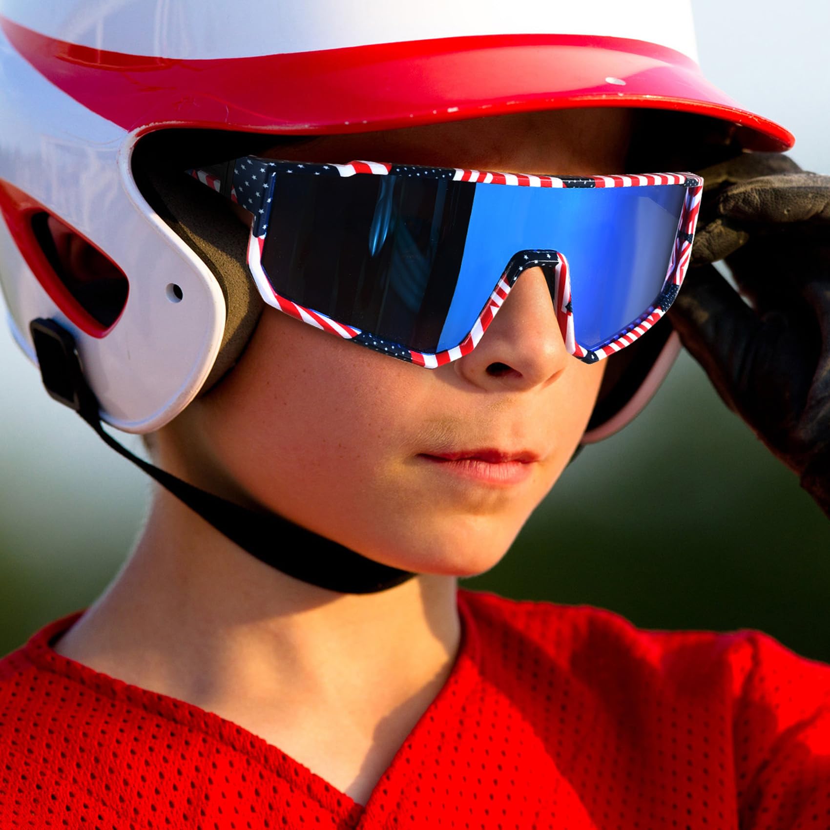 MVPTGRS child wearing sunglasses while playing baseball for eye protection