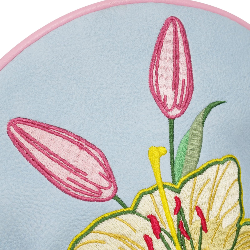 mytag embroidery close-up showing layered lily petals and lifelike stitching