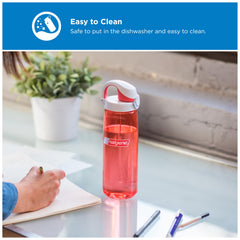 Nalgene bottle in car cupholder showing coral bottle fits standard holders for travel