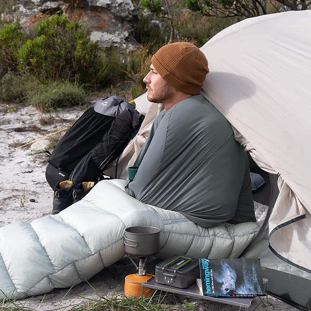 Naturehike lifestyle on hostel bed demonstrating hygienic travel comfort