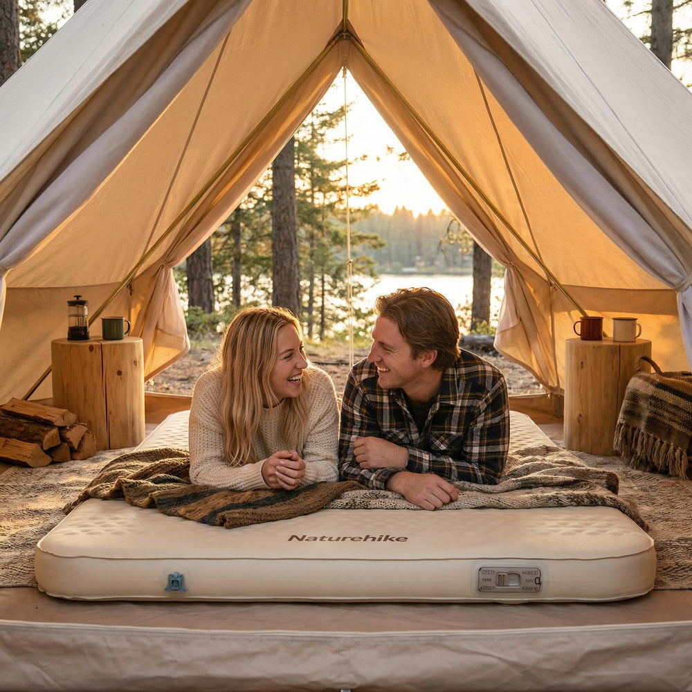 Naturehike mattress next to standing person illustrating full-XL size and scale benefit