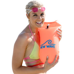 New Wave Swim Buoy front view showing bright orange visibility and flotation benefit