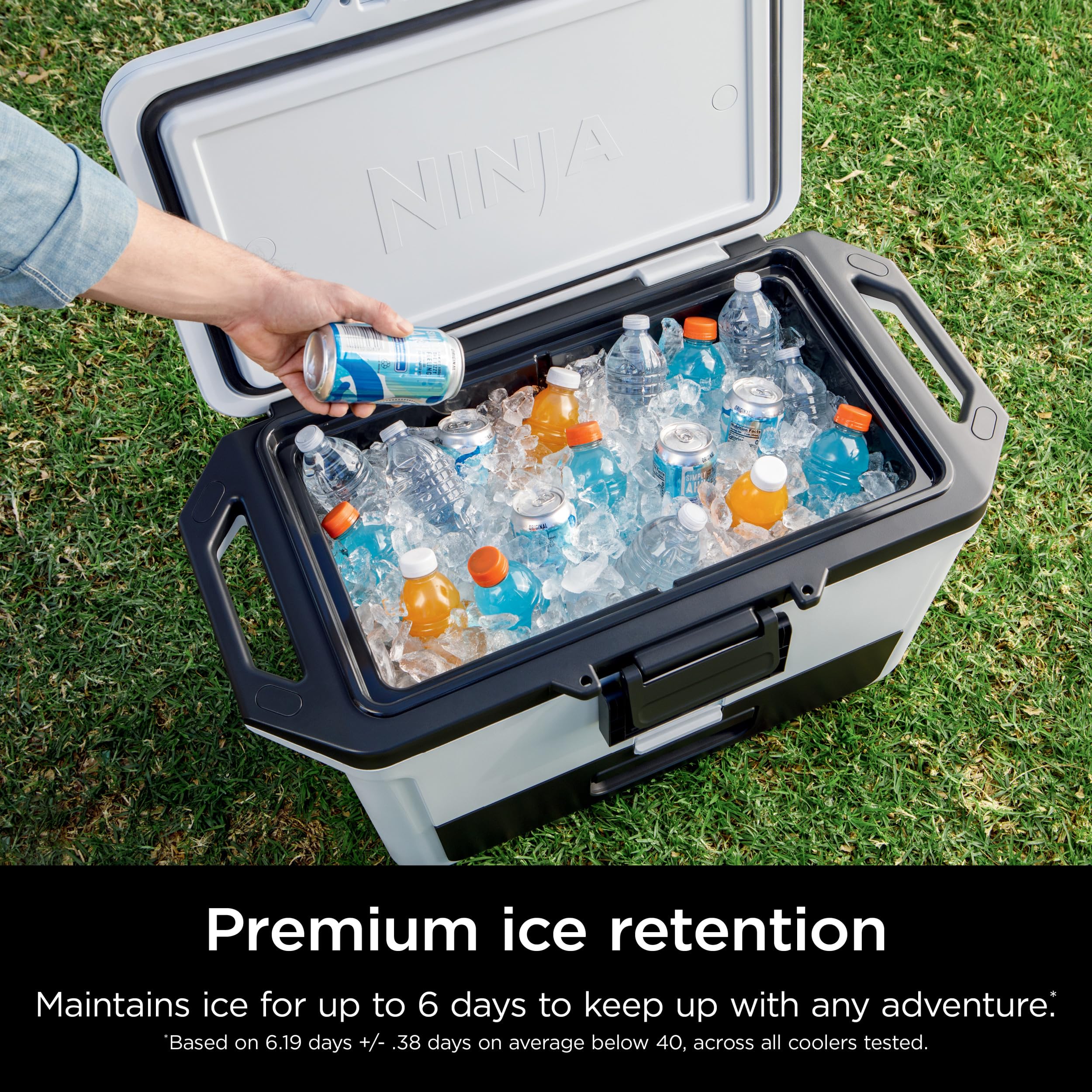 Ninja FrostVault next to cans showing 50-quart capacity and packing clarity benefit