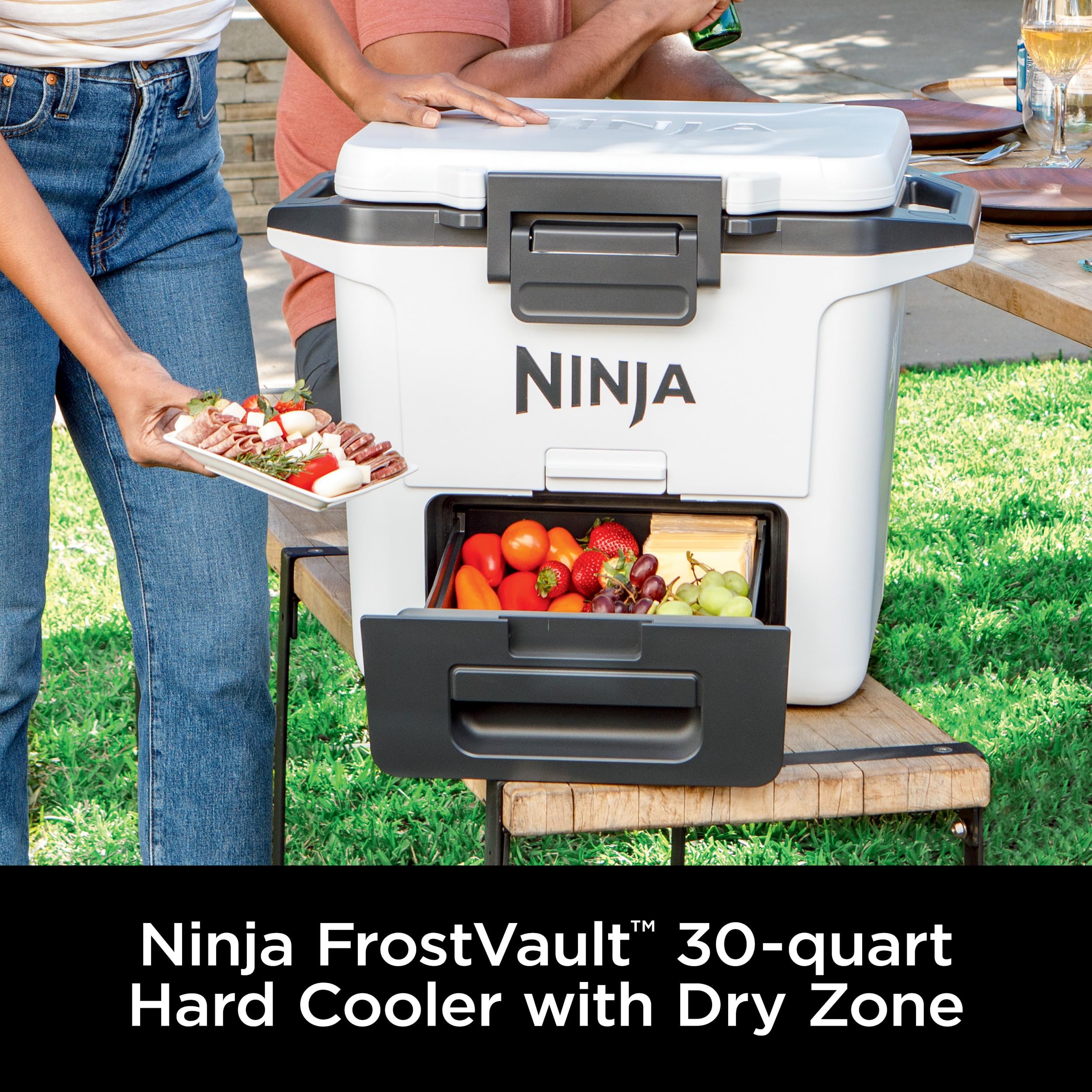 Ninja cooler open revealing dry drawer where food stays dry and organized