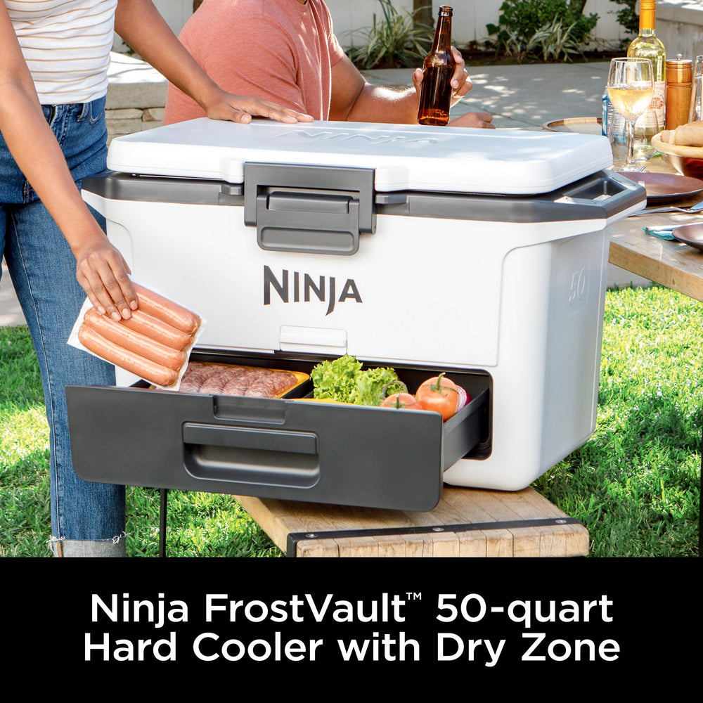Ninja FrostVault dry-zone drawer open displaying separated storage and convenience for snacks