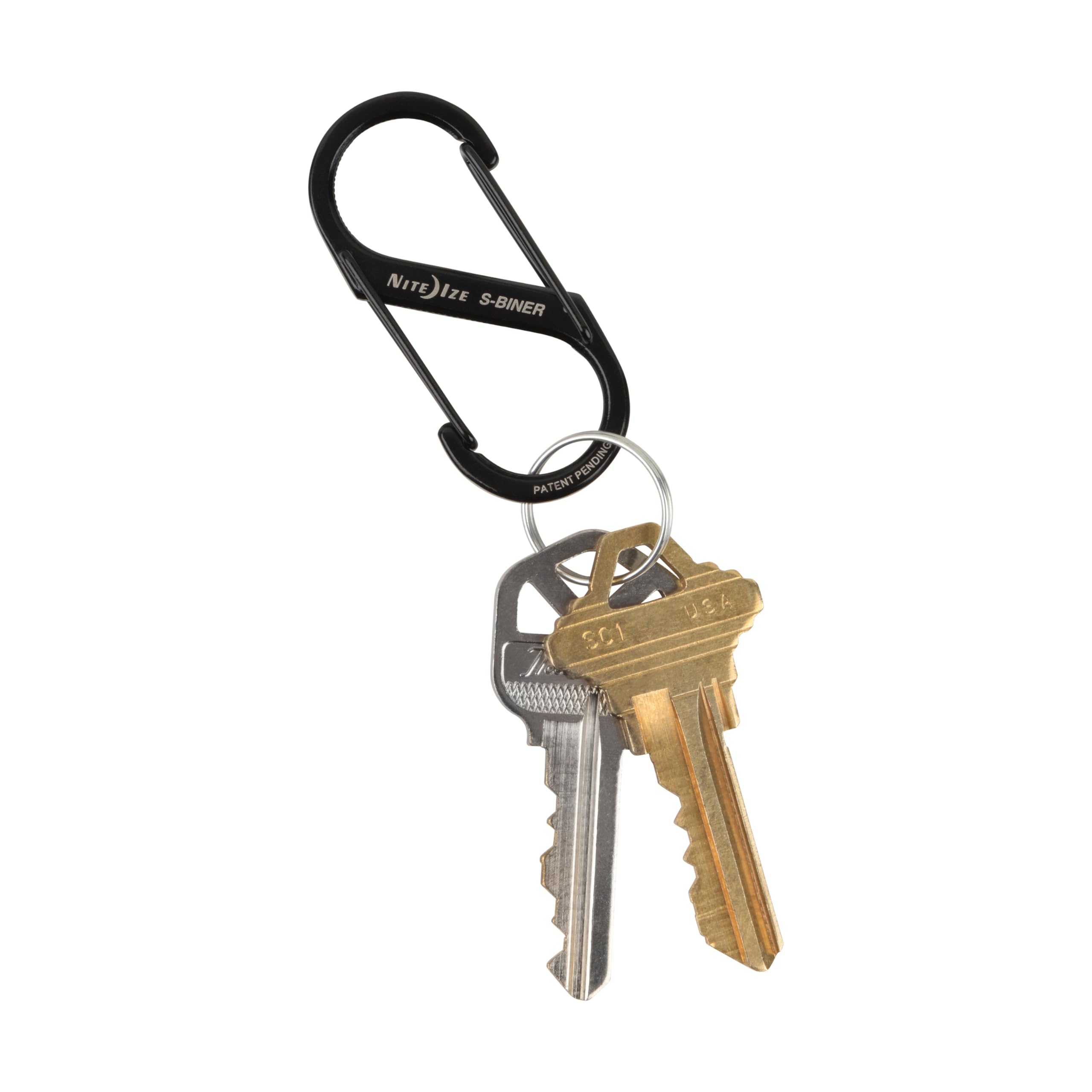 Nite Ize clipped to backpack strap keeping small gear accessible