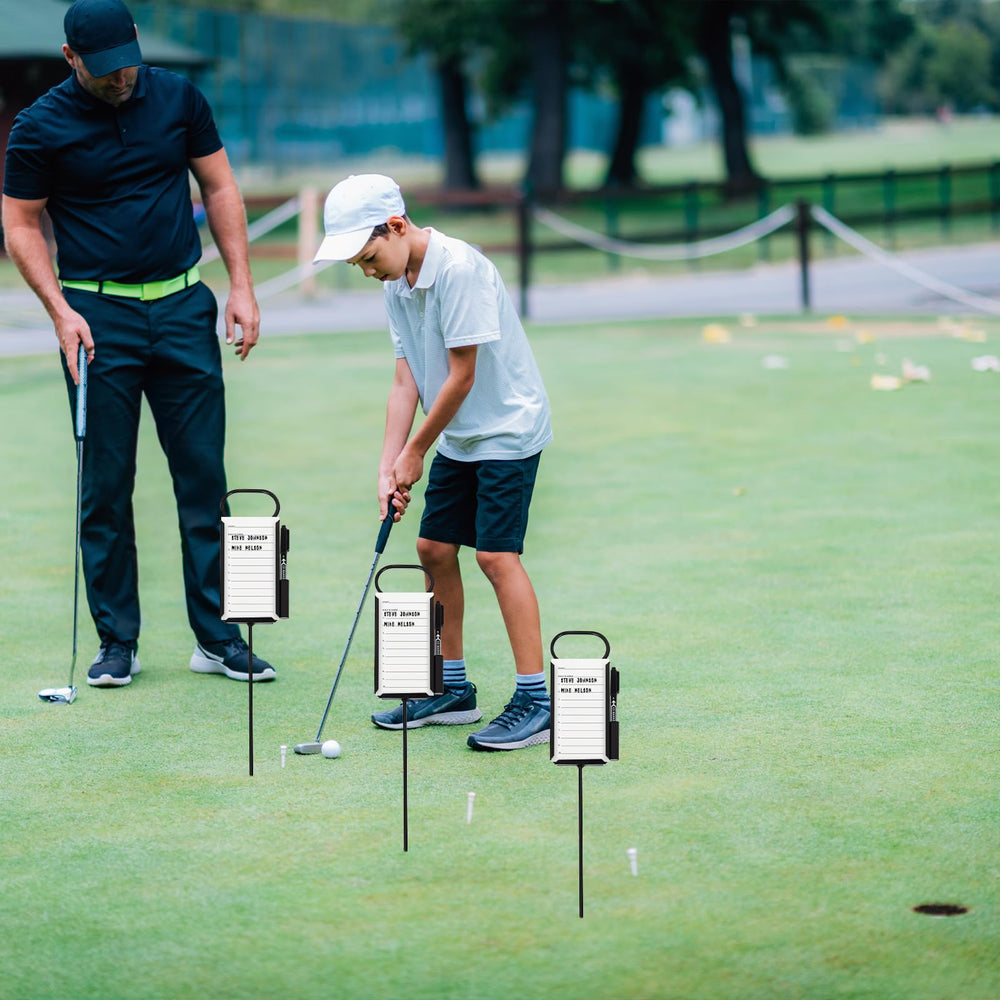 Niyanghome markers placed at a club putting contest showing organized event setup