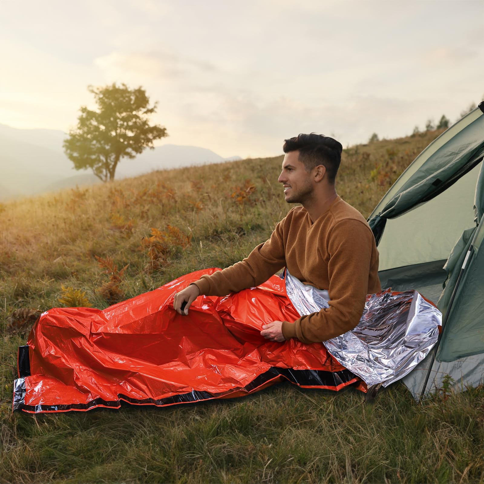 Noamus bivy in use at night displaying shelter function and retained warmth during outdoor rest