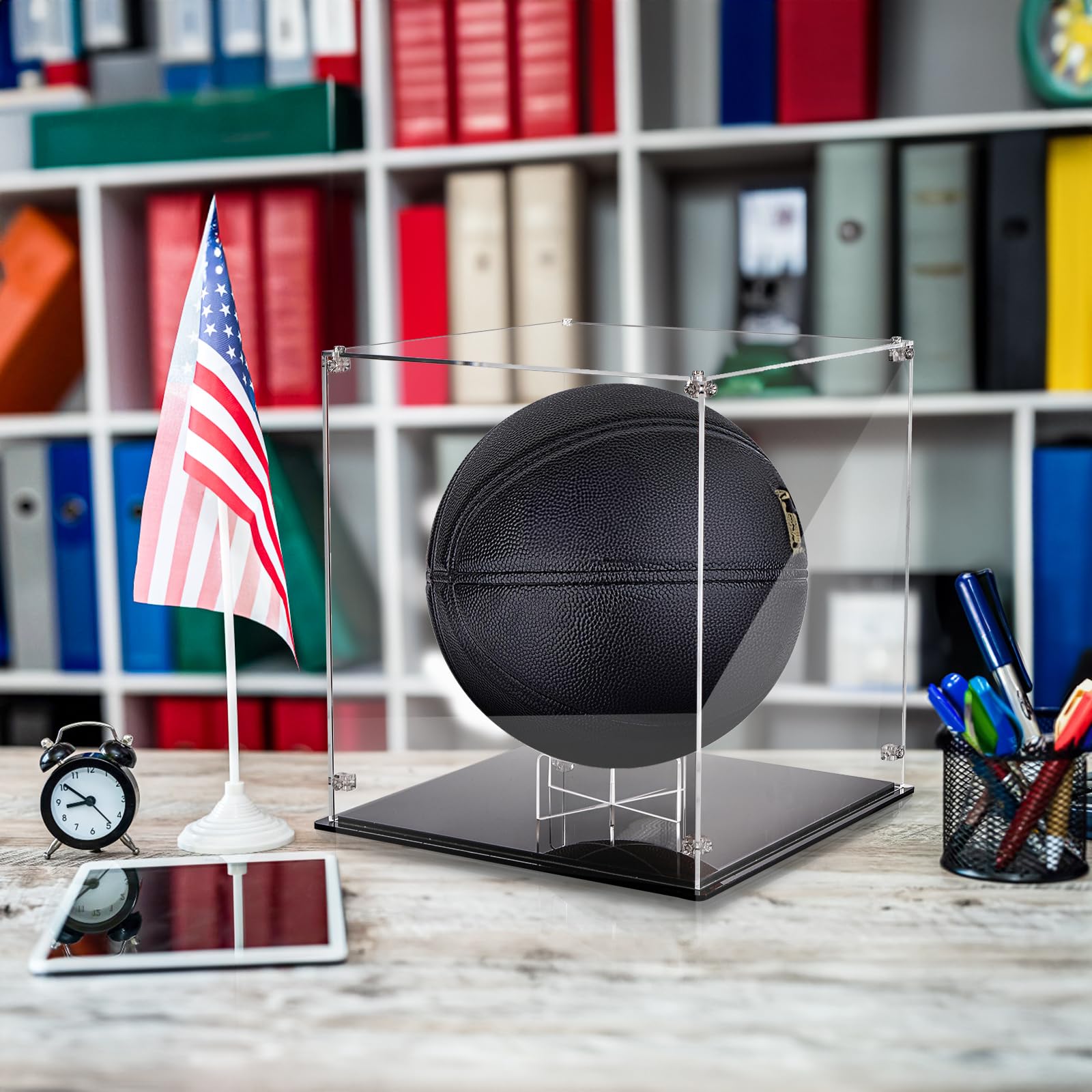 Noamus lifestyle shelf with multiple sports collectibles, suggests attractive presentation benefit