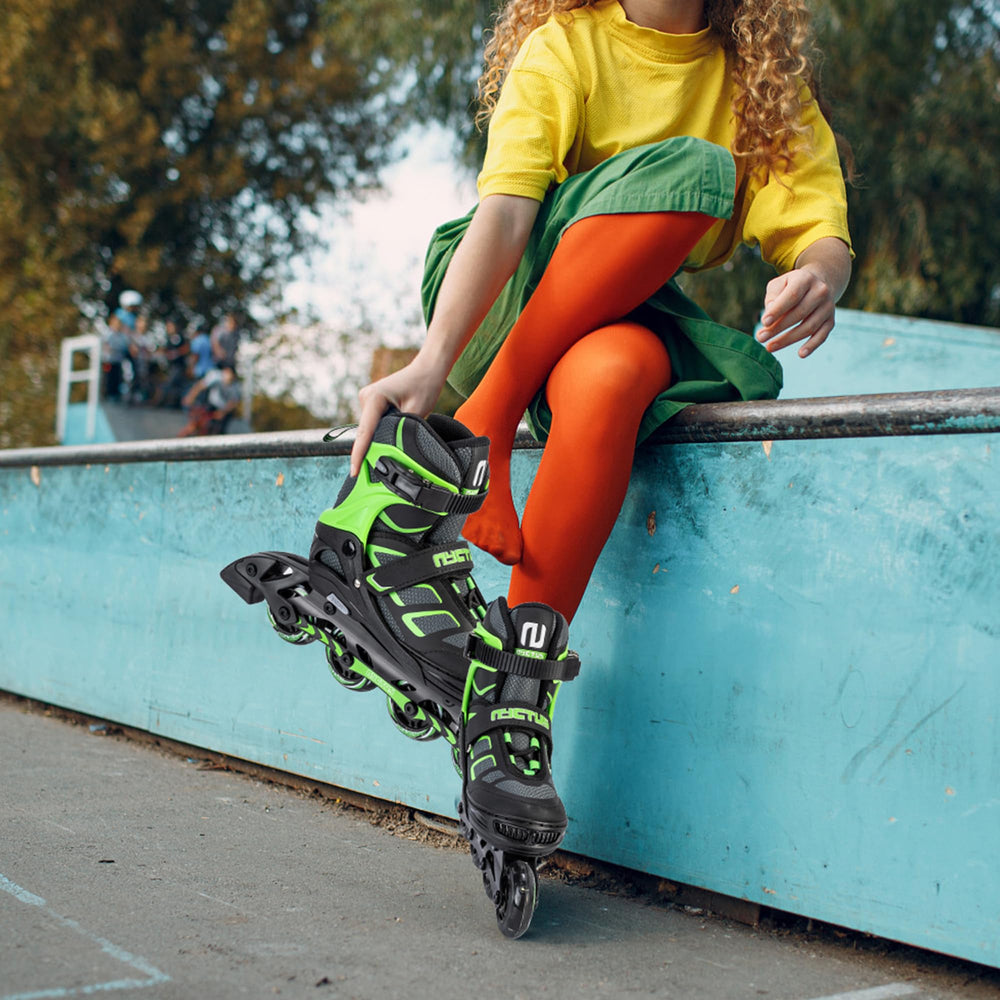 NYCTUS skates worn by users on a park path demonstrating recreational use