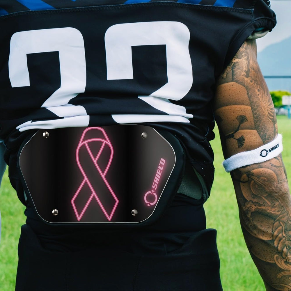 O SHIELD in use on the field showing visible graphic and athletic movement benefit