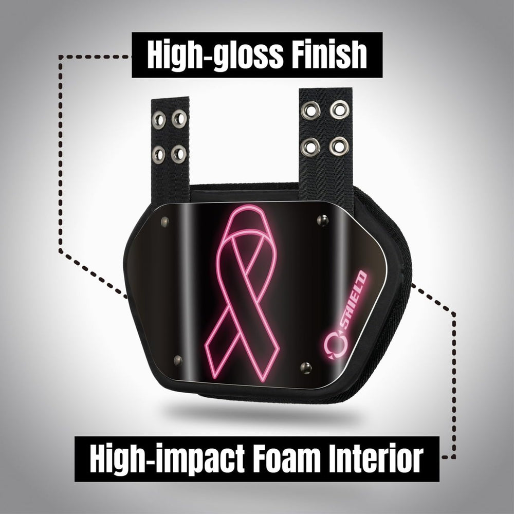 O SHIELD mounted on youth shoulder pads demonstrating secure lower-back coverage