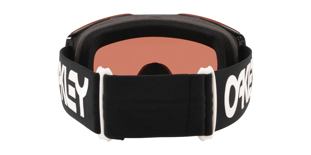 Oakley Fall Line XL worn by skier on slope showcasing comfort, helmet compatibility, and coverage