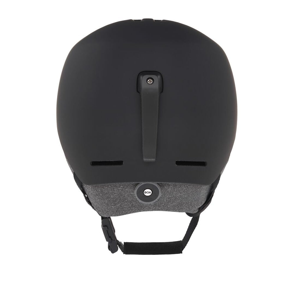 Oakley MOD1 worn on mountain showing integrated fit and goggle compatibility