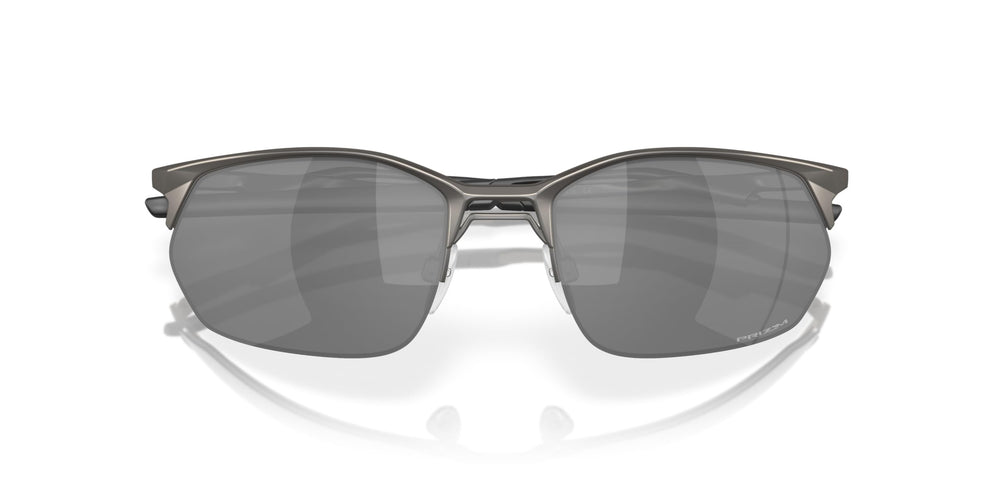 Oakley Wire Tap 2.0 size comparison with ruler showing 60mm lens width benefit