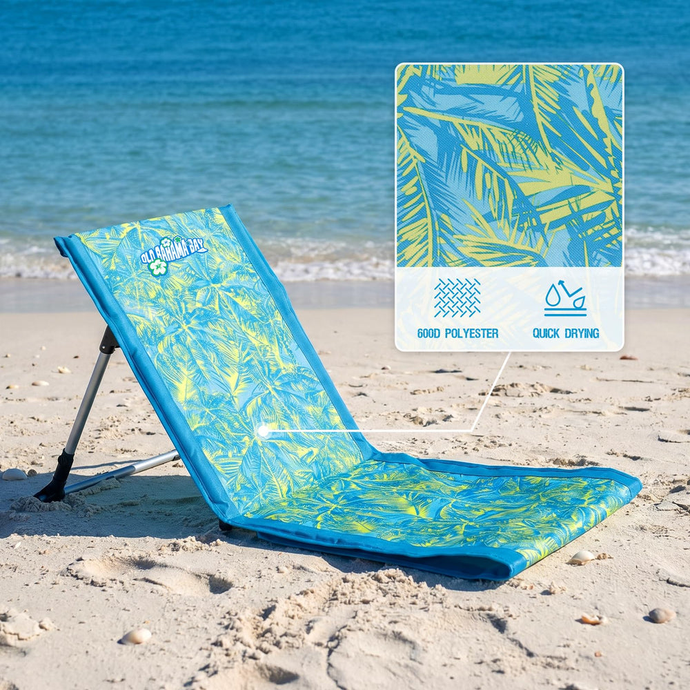 Old Bahama Bay lounge in use at beach offering relaxed reclining support