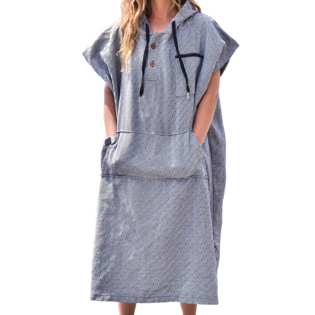 Open Road Goods poncho in use on beach offering privacy while changing