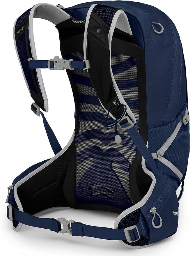 Osprey Talon worn on a mountain trail showing stable carry and all-day comfort