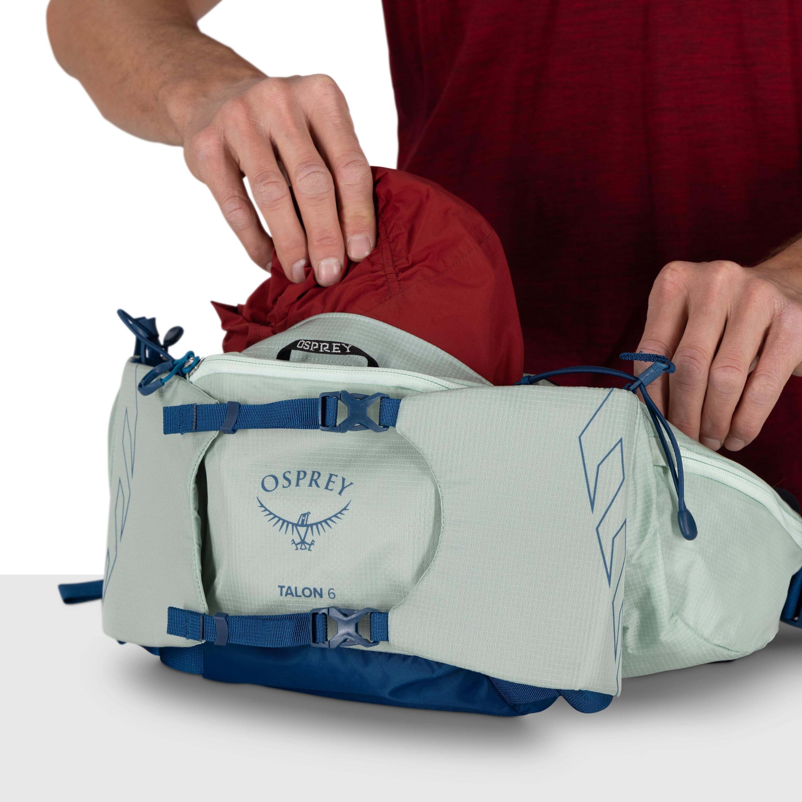 Osprey Talon 6L on hiking trail illustrating lightweight outdoor use