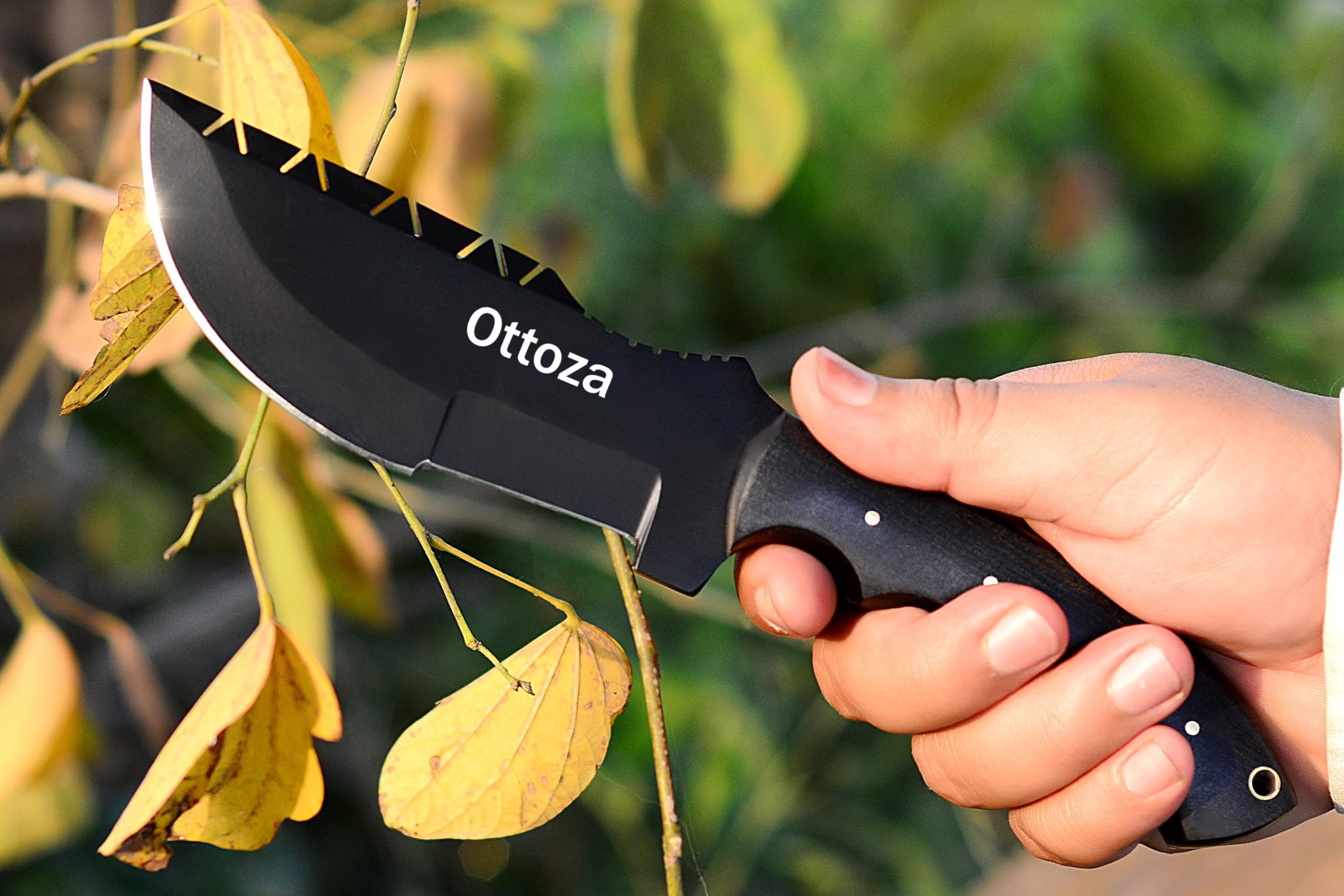 Ottoza tracker blade close-up highlighting 1095 carbon steel edge durability