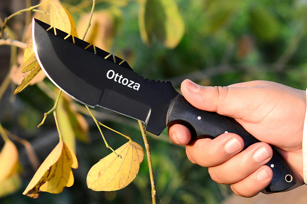 Ottoza tracker blade close-up highlighting 1095 carbon steel edge durability
