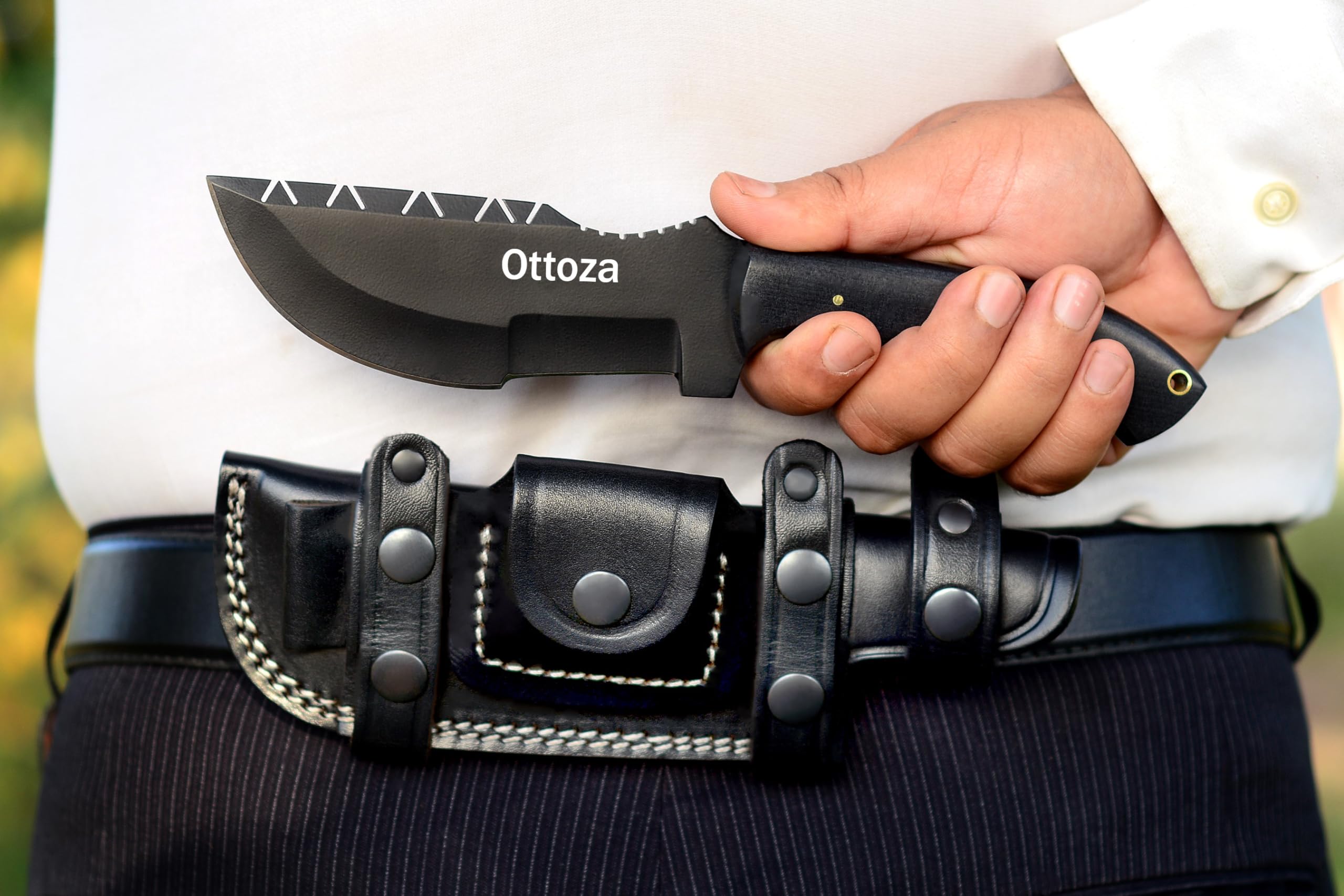Ottoza tracker handle detail showing Micarta texture for secure grip