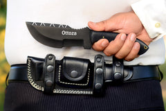 Ottoza tracker handle detail showing Micarta texture for secure grip