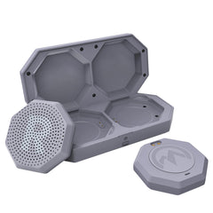OutdoorMaster front view of helmet speakers showing compact design and case benefit