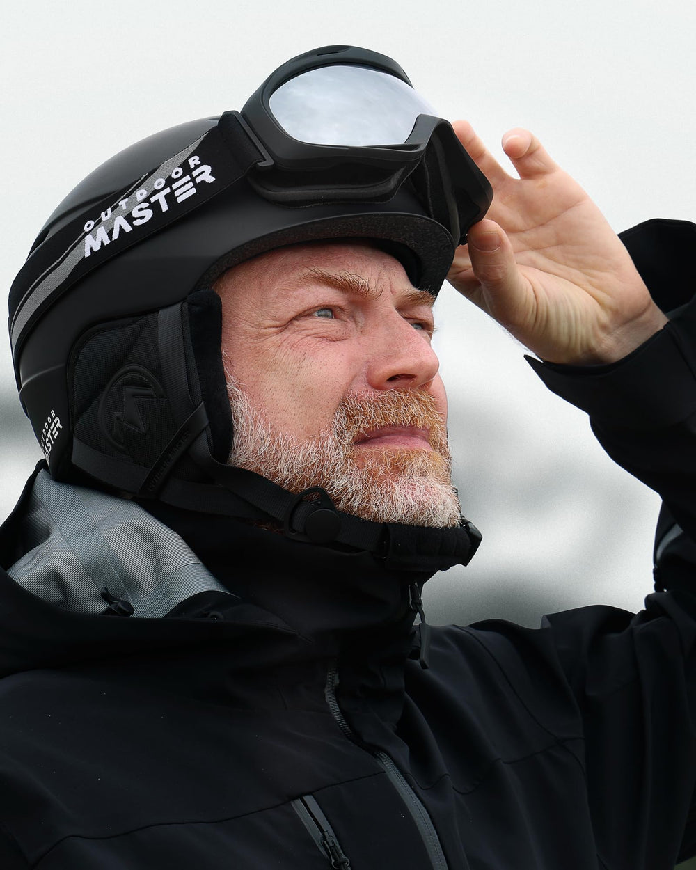 OutdoorMaster helmet beside ruler for size scale and easy fit selection