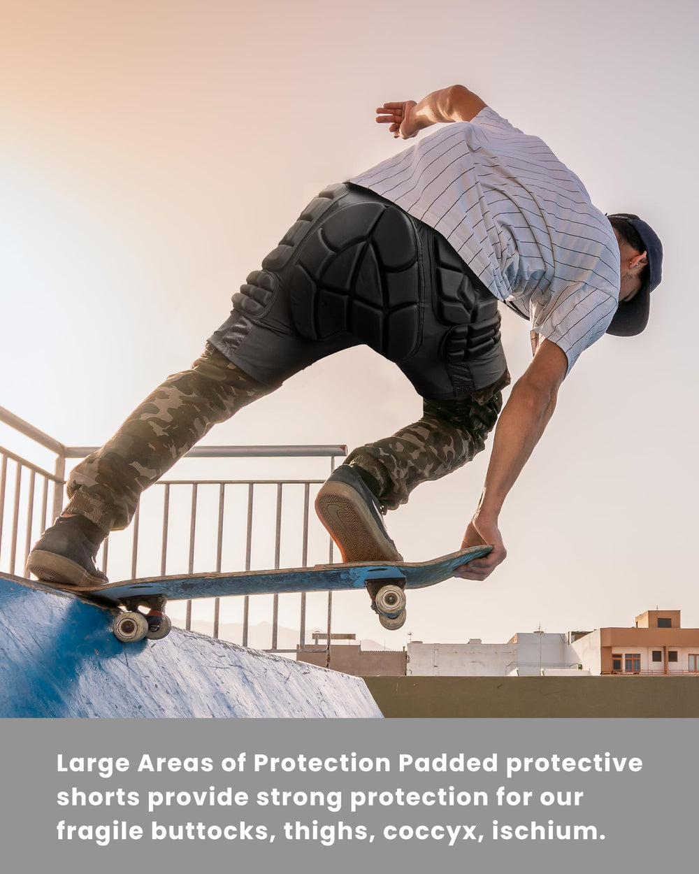 OutdoorMaster snowboarder wearing shorts showing protection during ride