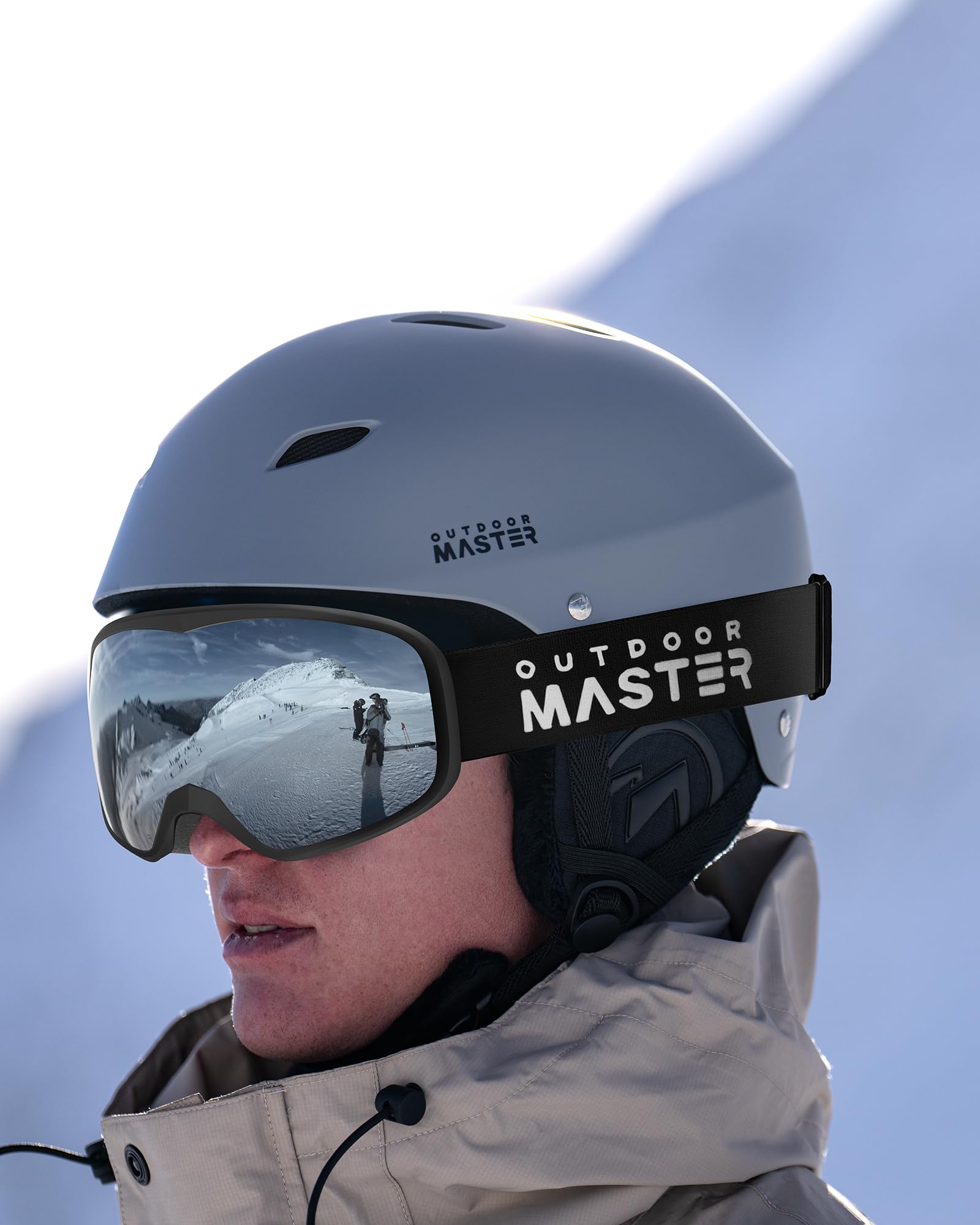 OutdoorMaster Owl on-slope action shot showing goggles in use for confident riding
