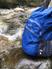 Outlander backpack in use on trail illustrating hands-free convenience and durability