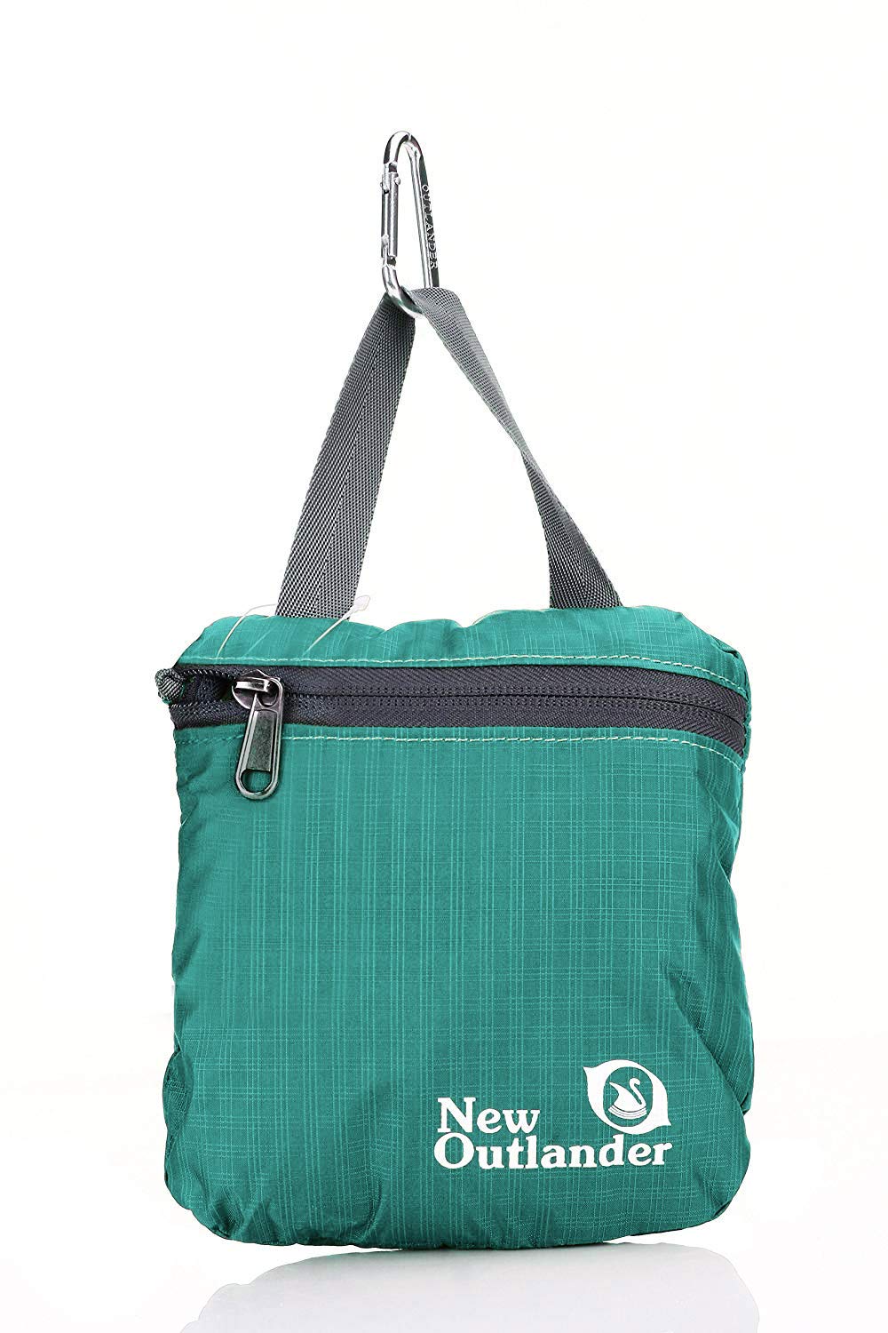 Outlander worn by traveler demonstrating lightweight, packable benefit