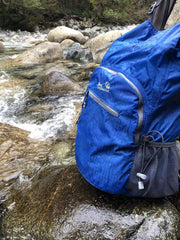 Outlander side pockets with water bottle showing quick access and hydration convenience