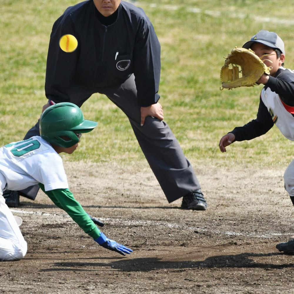 Outus foam baseball shown in adult hand illustrating realistic size and grip
