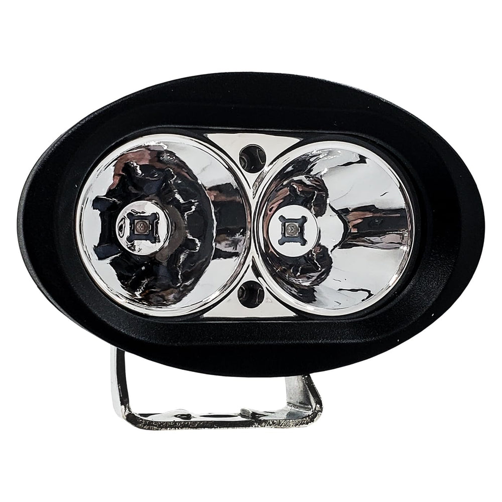 OZ-USA headlight in hand for scale showing compact size and lightweight advantage