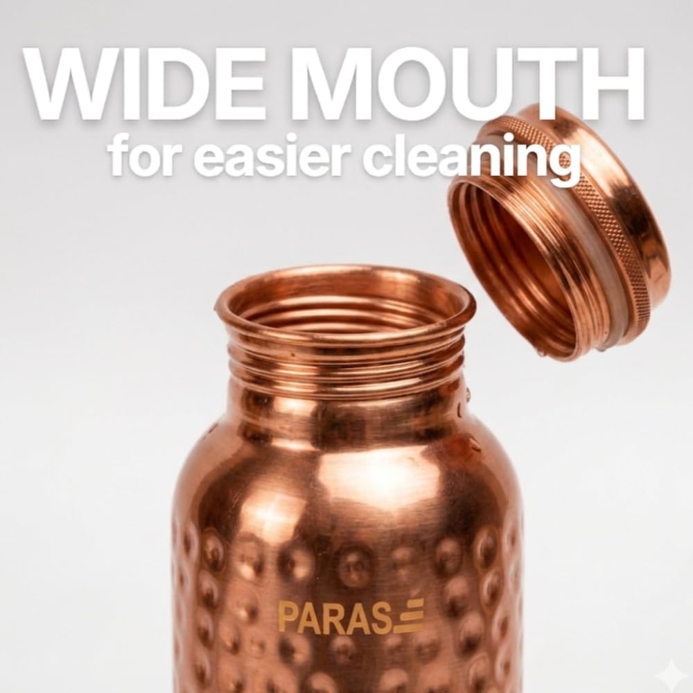 PARAS bottle held in hand showing 32 oz scale and ergonomic comfort