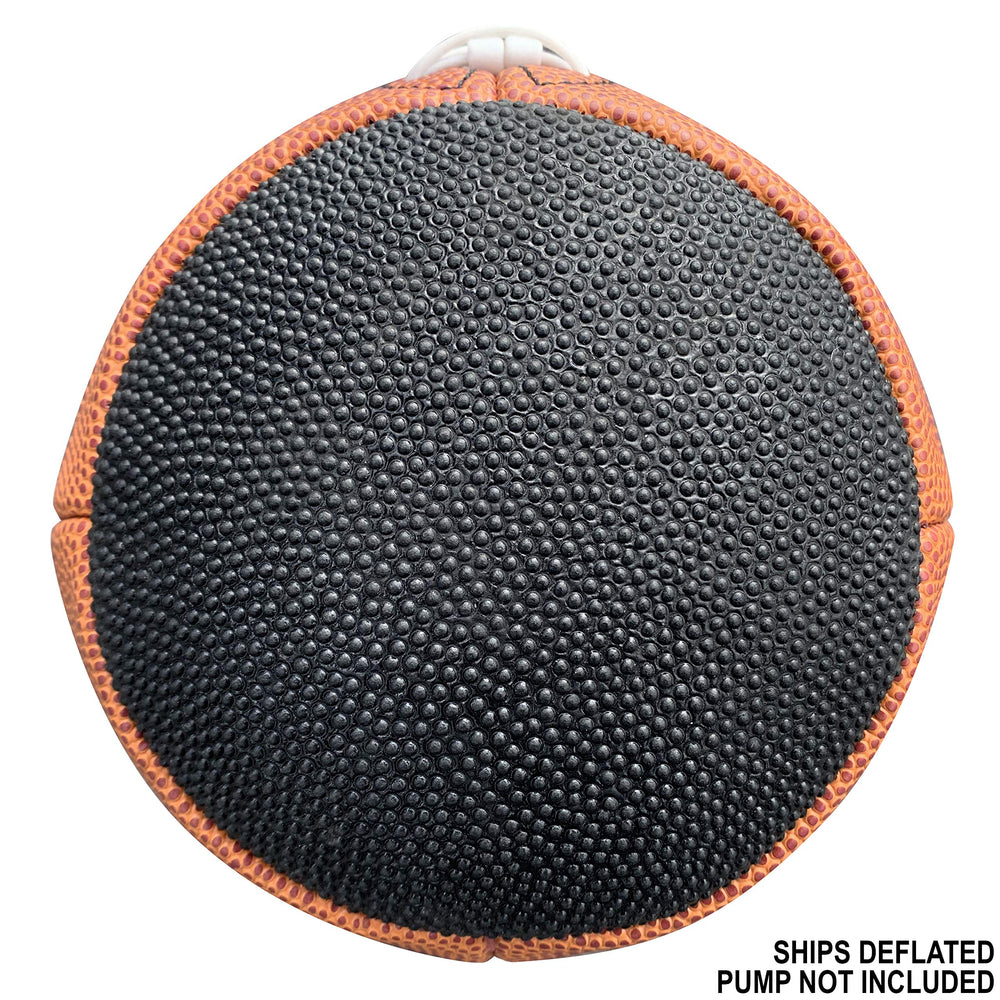 Passback brand football resting on gym floor highlighting use on indoor surfaces for repetitive training sessions