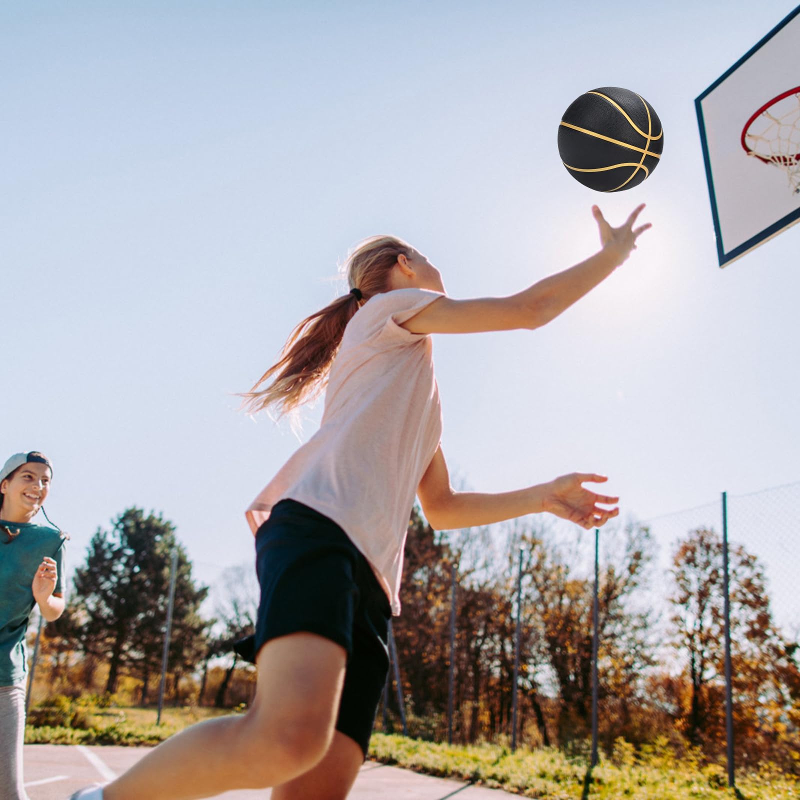 PECOGO basketball sitting on outdoor court demonstrating surface durability