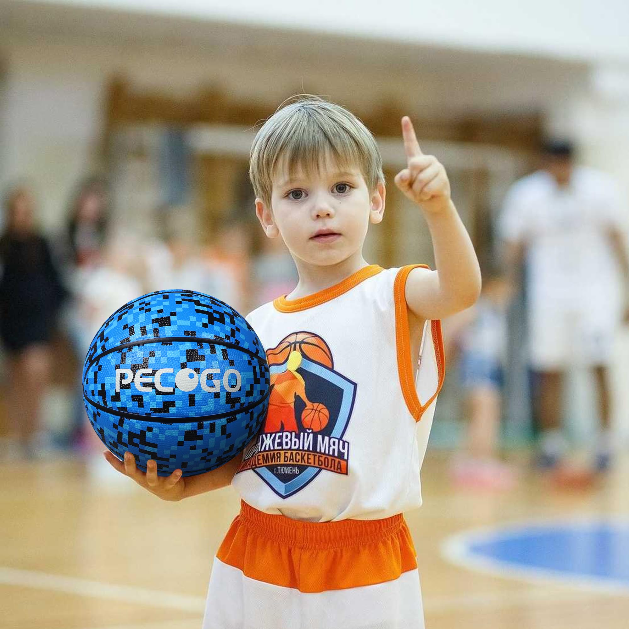 PECOGO ball on concrete playground demonstrating abrasion resistance and outdoor durability