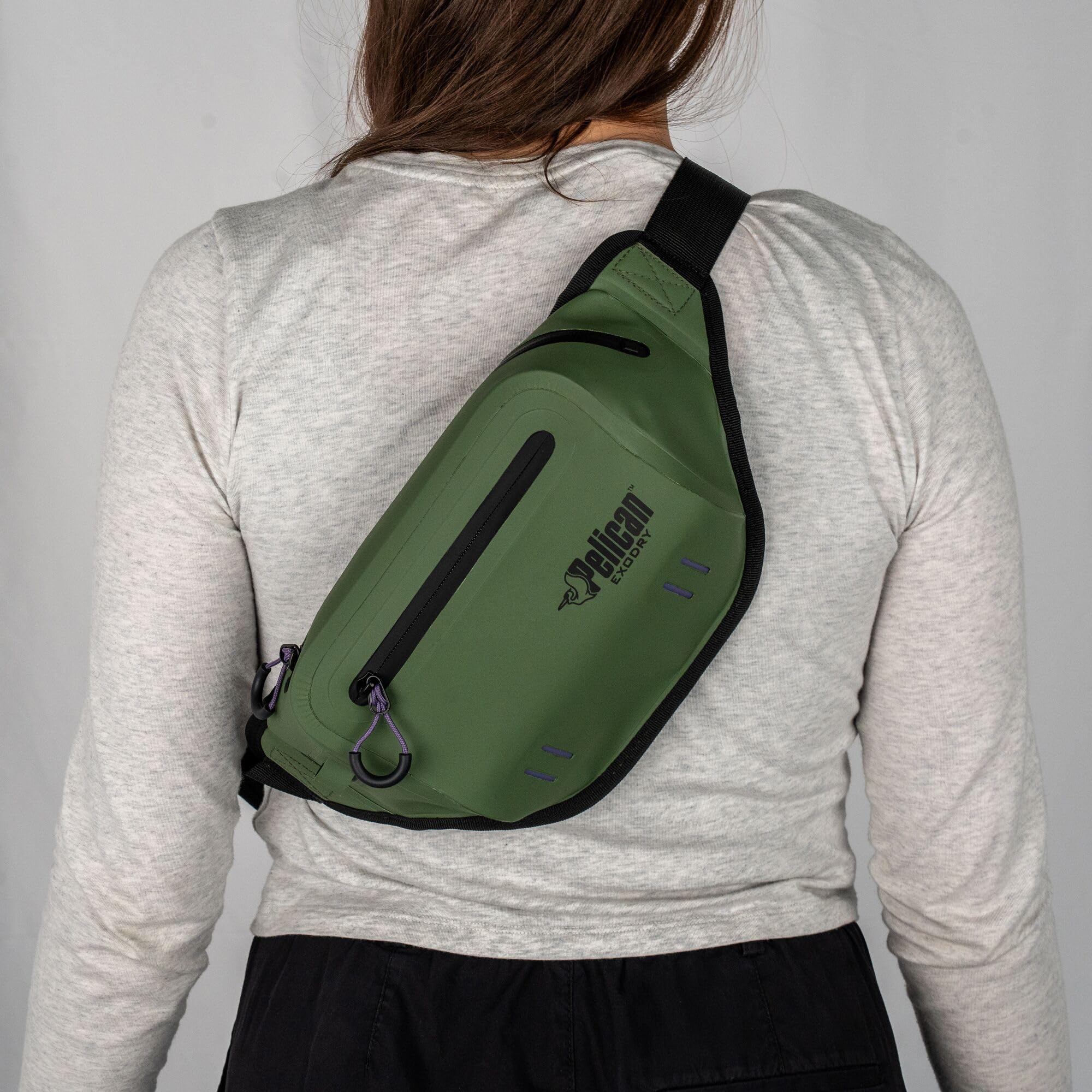 Pelican Exodry worn by hiker demonstrating secure fit and accessibility
