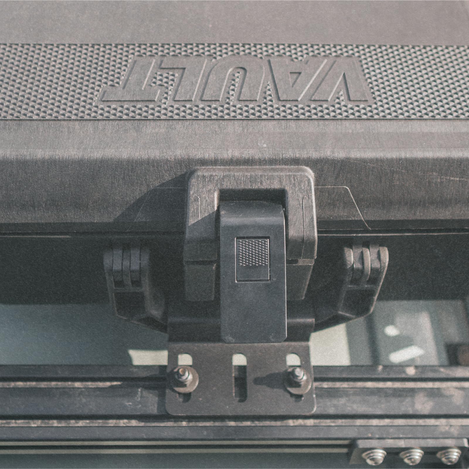 Pelican mount installed on vehicle roof rack carrying a Vault case for space-saving benefit