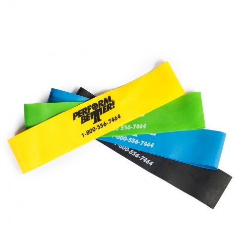 Perform Better mini band set front view showing four color-coded loops and compact packaging for convenient storage