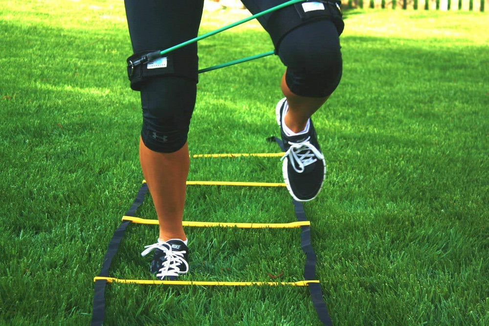 Perry Ellis bands in outdoor training setting illustrating portability and field use