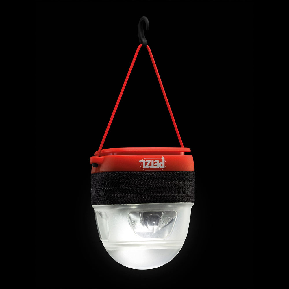 Petzl NOCTILIGHT covering a headlamp to protect it from accidental activation and impact