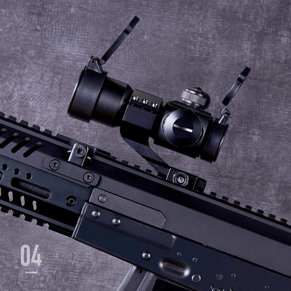 Pinty close-up of adjustment knobs and illuminated red green reticle for fast aiming