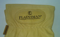 Plainsman gloves worn while handling tools demonstrating grip and dexterity