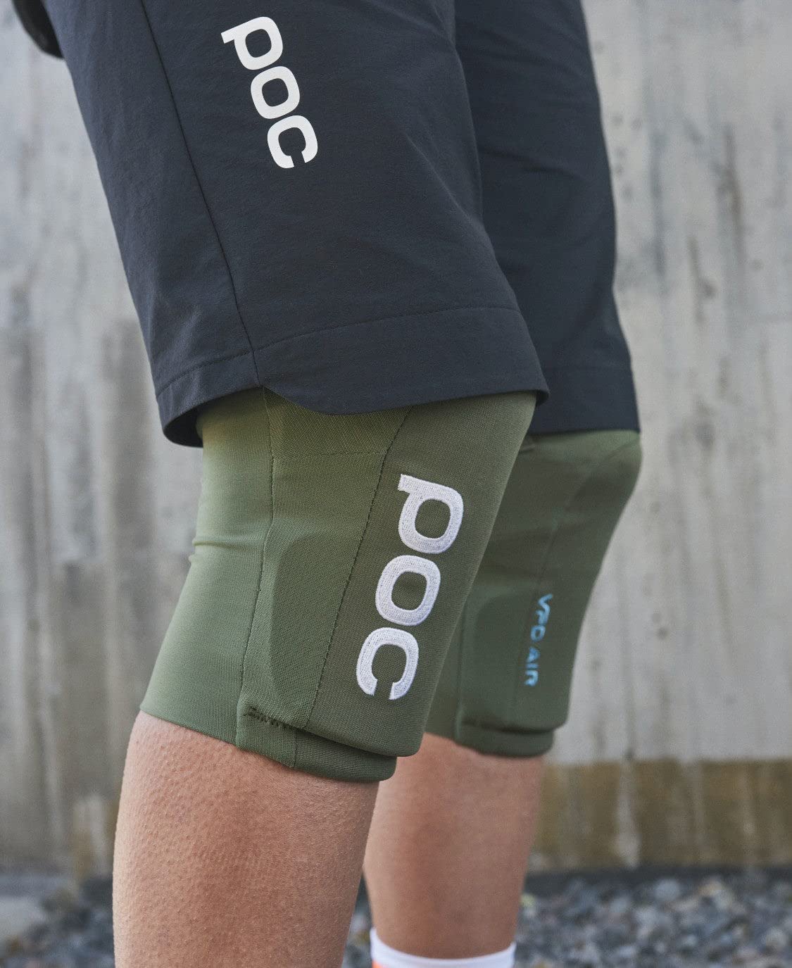 POC protector next to hand to show compact size and lightweight benefit